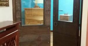 Restauro portone in legno di castagno