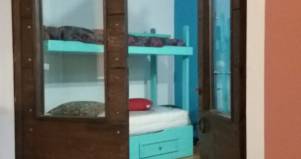 Restauro portone in legno di castagno